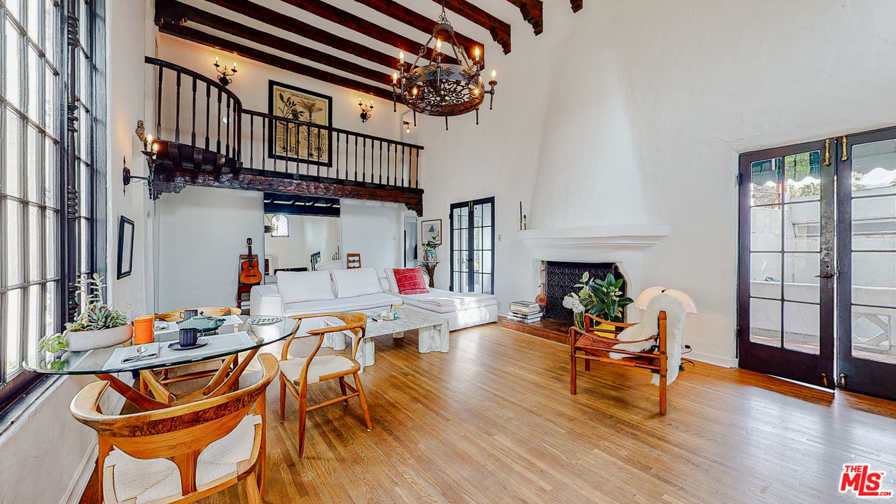 6854 Iris Circle Los Angeles, CA 90068 - Photo 2 of 35 a dining room with furniture and wooden floor