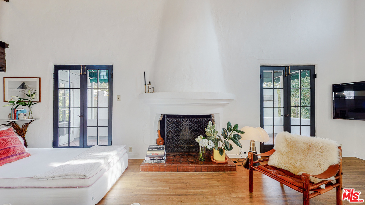 6854 Iris Circle Los Angeles, CA 90068 - Photo 4 of 35 a living room with furniture and a fireplace