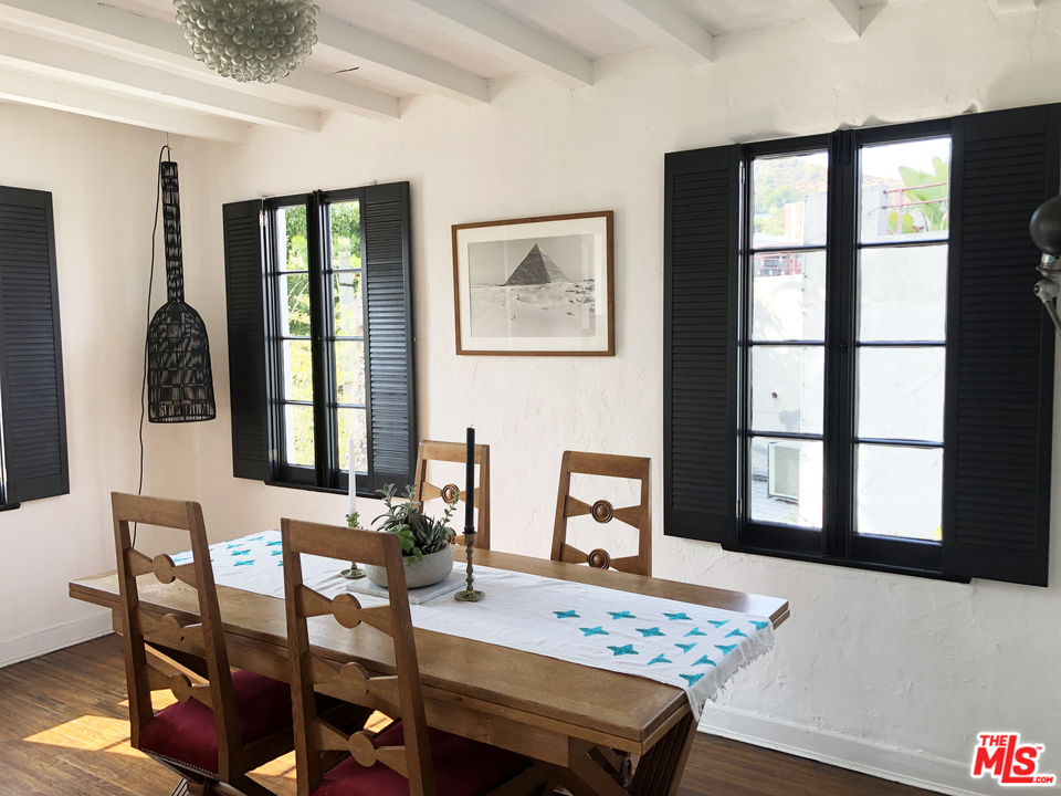 6854 Iris Circle Los Angeles, CA 90068 - Photo 8 of 35 a view of a dining room with furniture and window