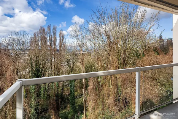 a view of a balcony with an outdoor space