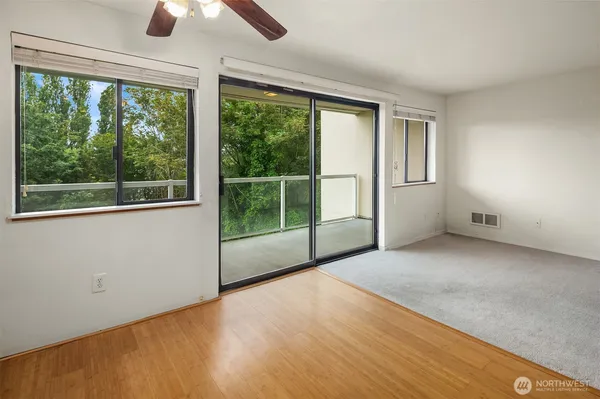 a kitchen with stainless steel appliances a refrigerator and a stove top oven