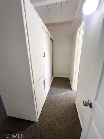 a view of a backyard with sitting area