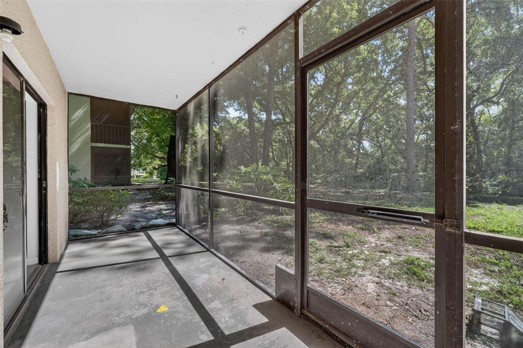 11715 Raintree Village Boulevard, Unit A Temple Terrace, FL 33617 - Photo 19 of 30 a view of a room with a large window