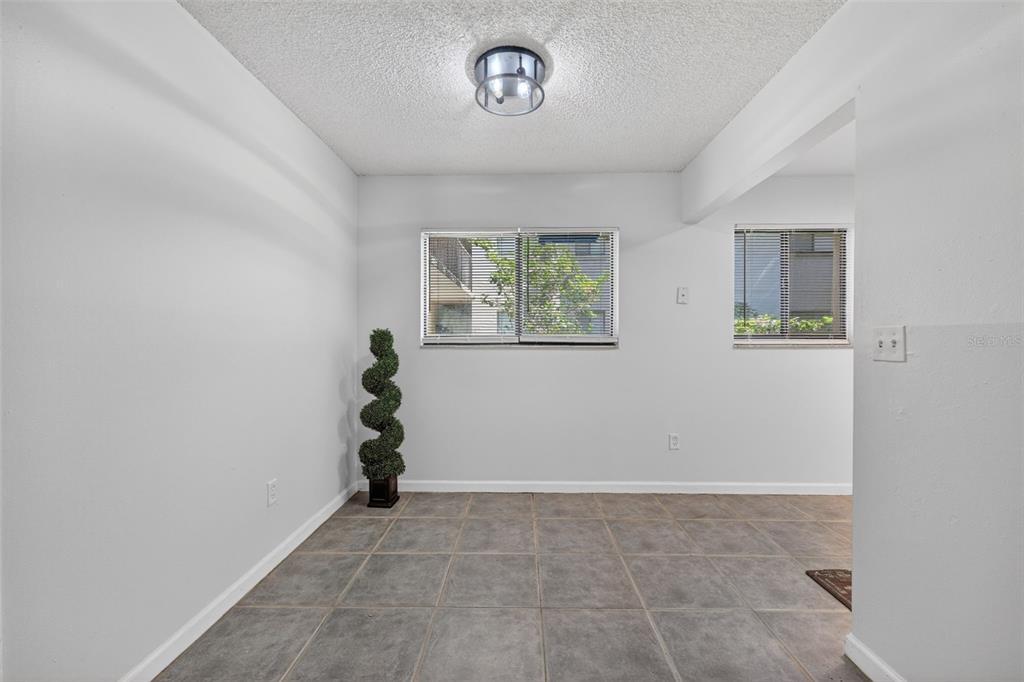 11715 Raintree Village Boulevard, Unit A Temple Terrace, FL 33617 - Photo 5 of 30 a view of entryway with window
