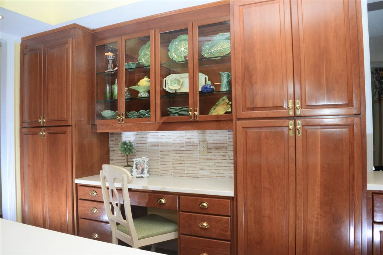 8808 Ross Court Raleigh, NC 27613 - Photo 6 of 25 This is very convenient for times when you need to multi-task. Kitchen workspace