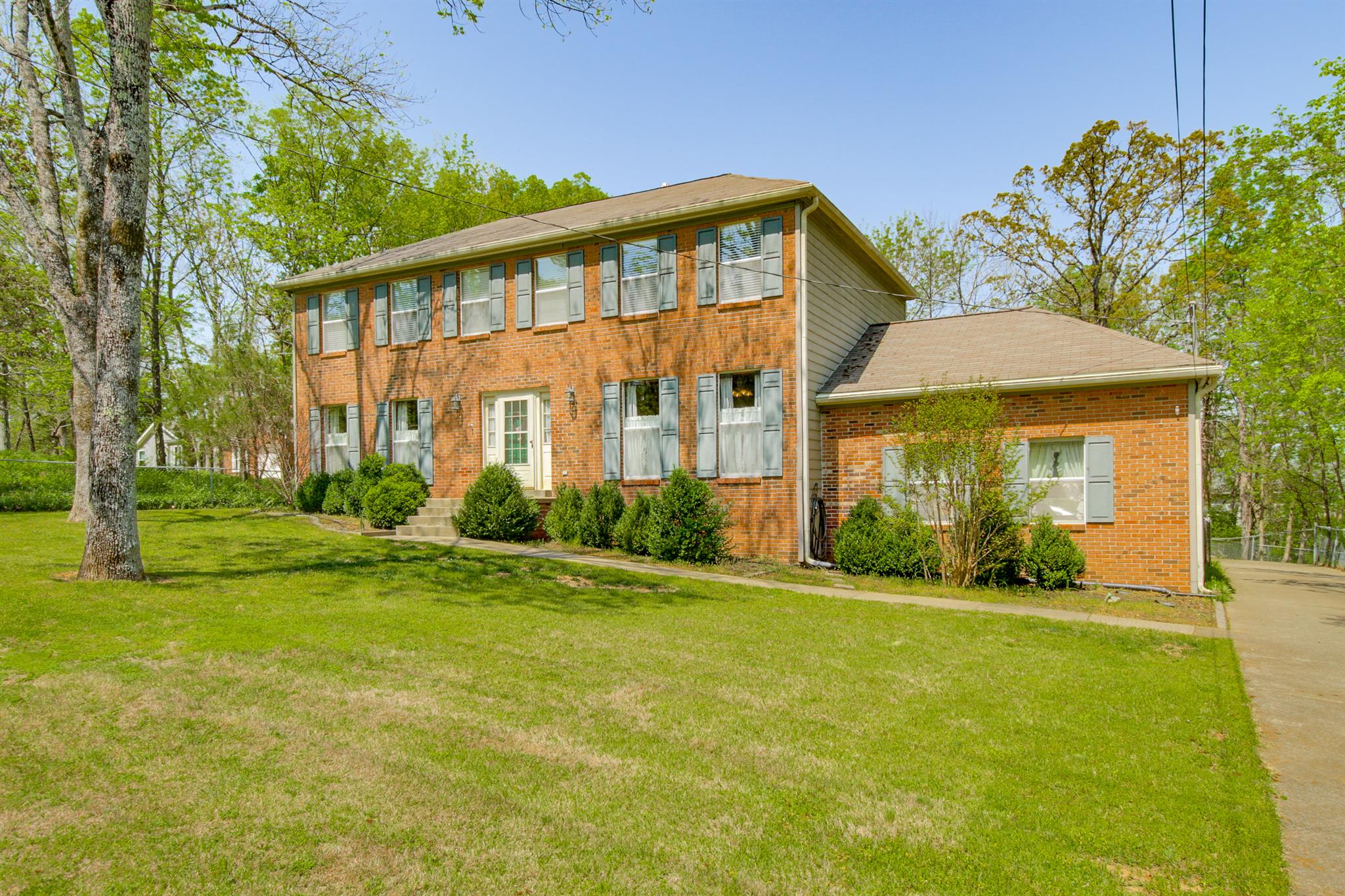 3128 Anderson Road Antioch, TN 37013 - Photo 1 of 27 a front view of a house with a yard