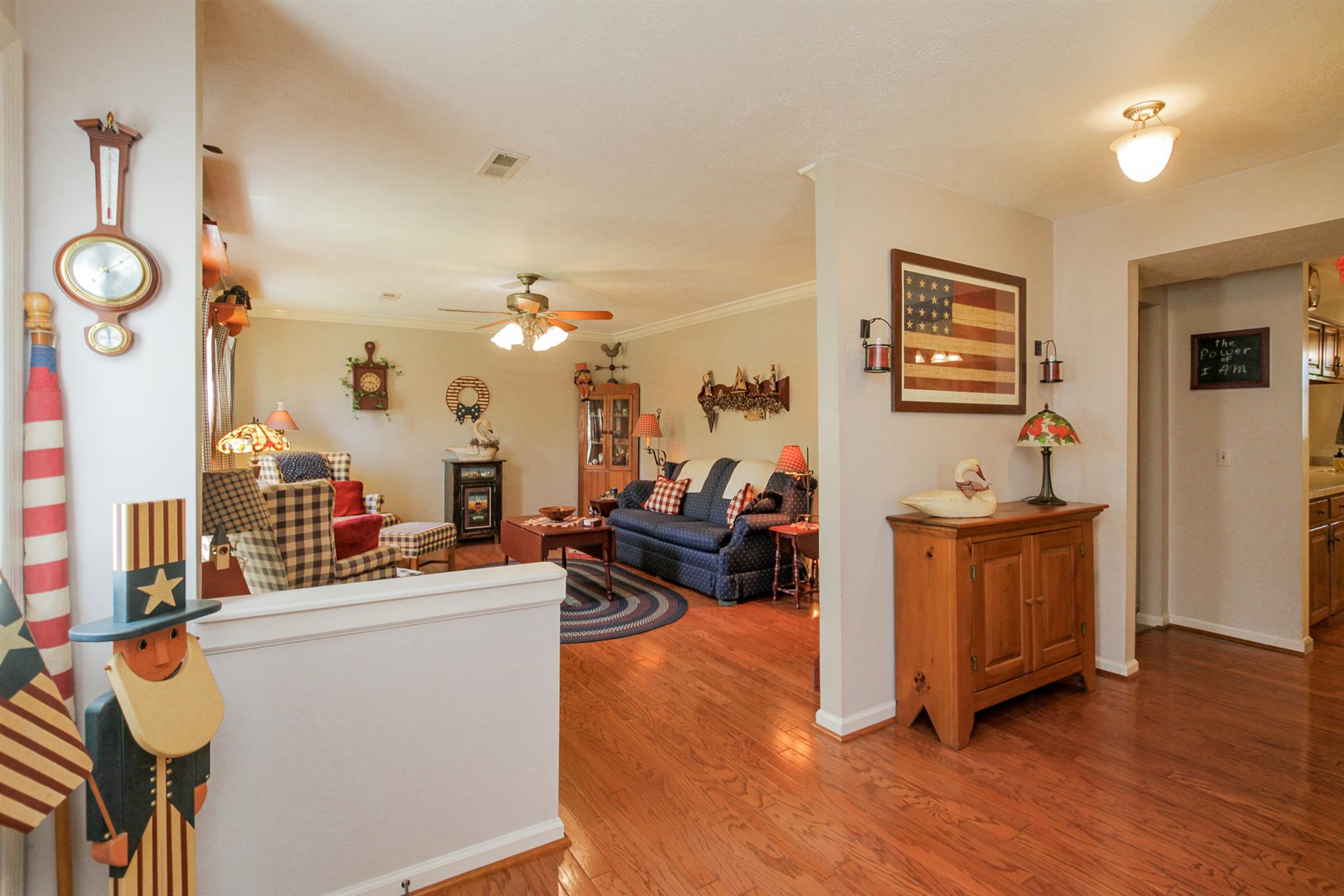 3128 Anderson Road Antioch, TN 37013 - Photo 3 of 27 a living room with furniture a flat screen tv and a wooden floor