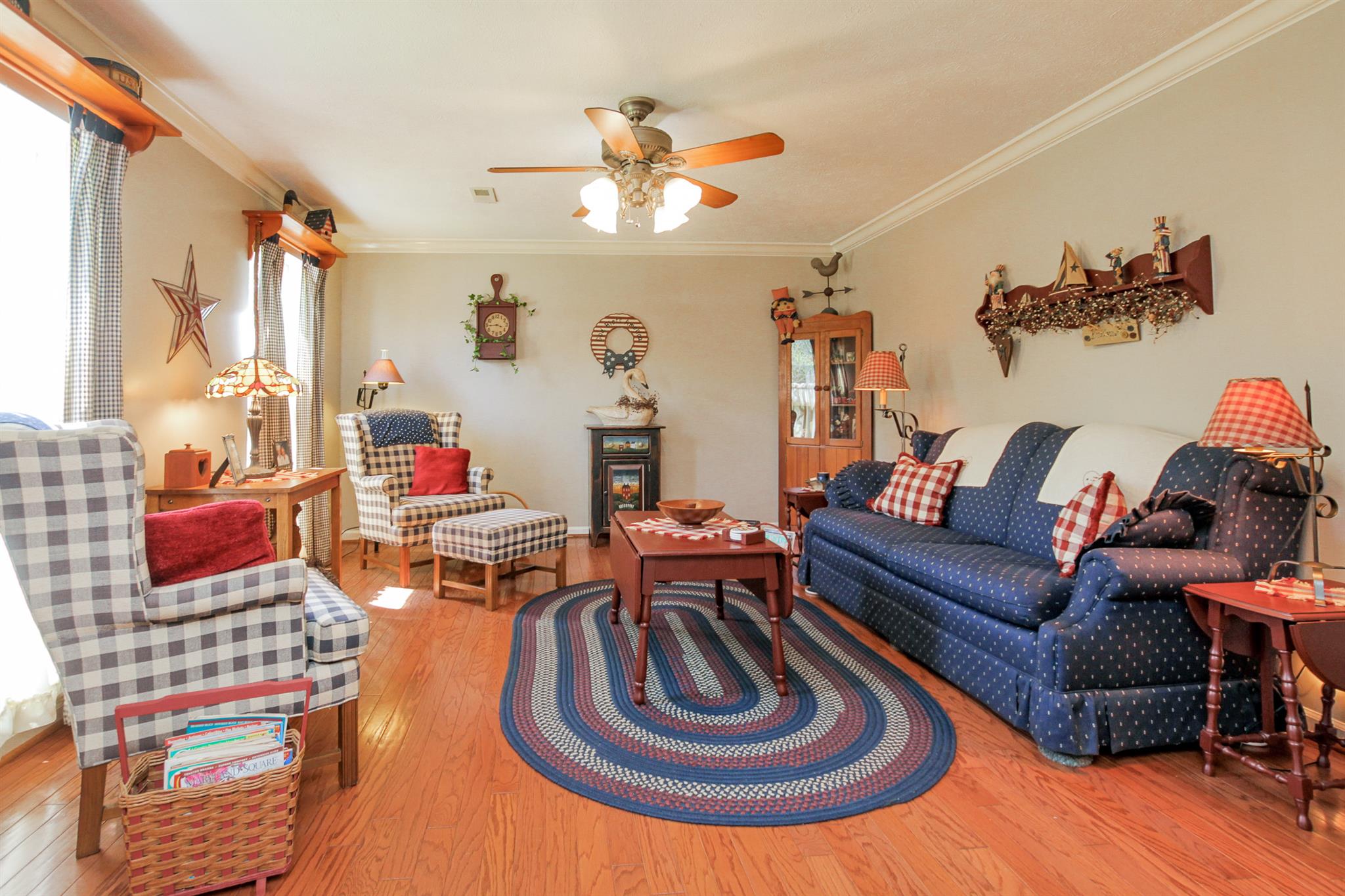 3128 Anderson Road Antioch, TN 37013 - Photo 4 of 27 a living room with furniture and a chandelier