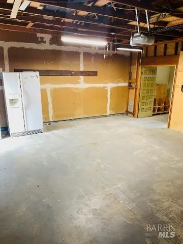 a view of a room with wooden walls