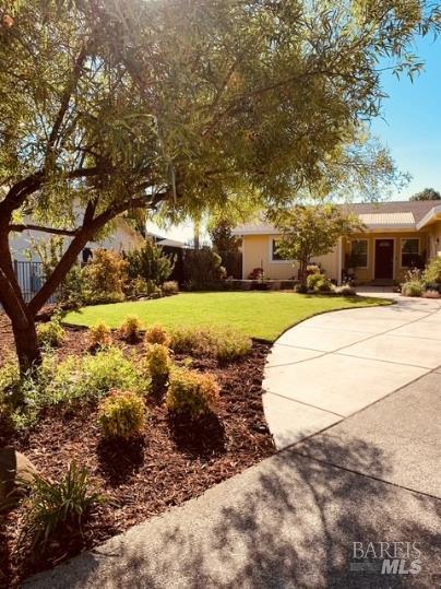 920 Linwood Street Vacaville, CA 95688 - Photo 28 of 38 a view of a yard with yellow house
