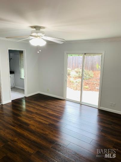 920 Linwood Street Vacaville, CA 95688 - Photo 8 of 38 a view of an empty room with wooden floor and a window