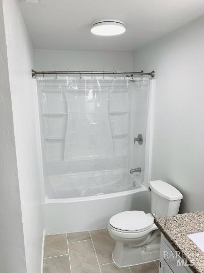 920 Linwood Street Vacaville, CA 95688 - Photo 9 of 38 a bathroom with a granite countertop toilet and a shower