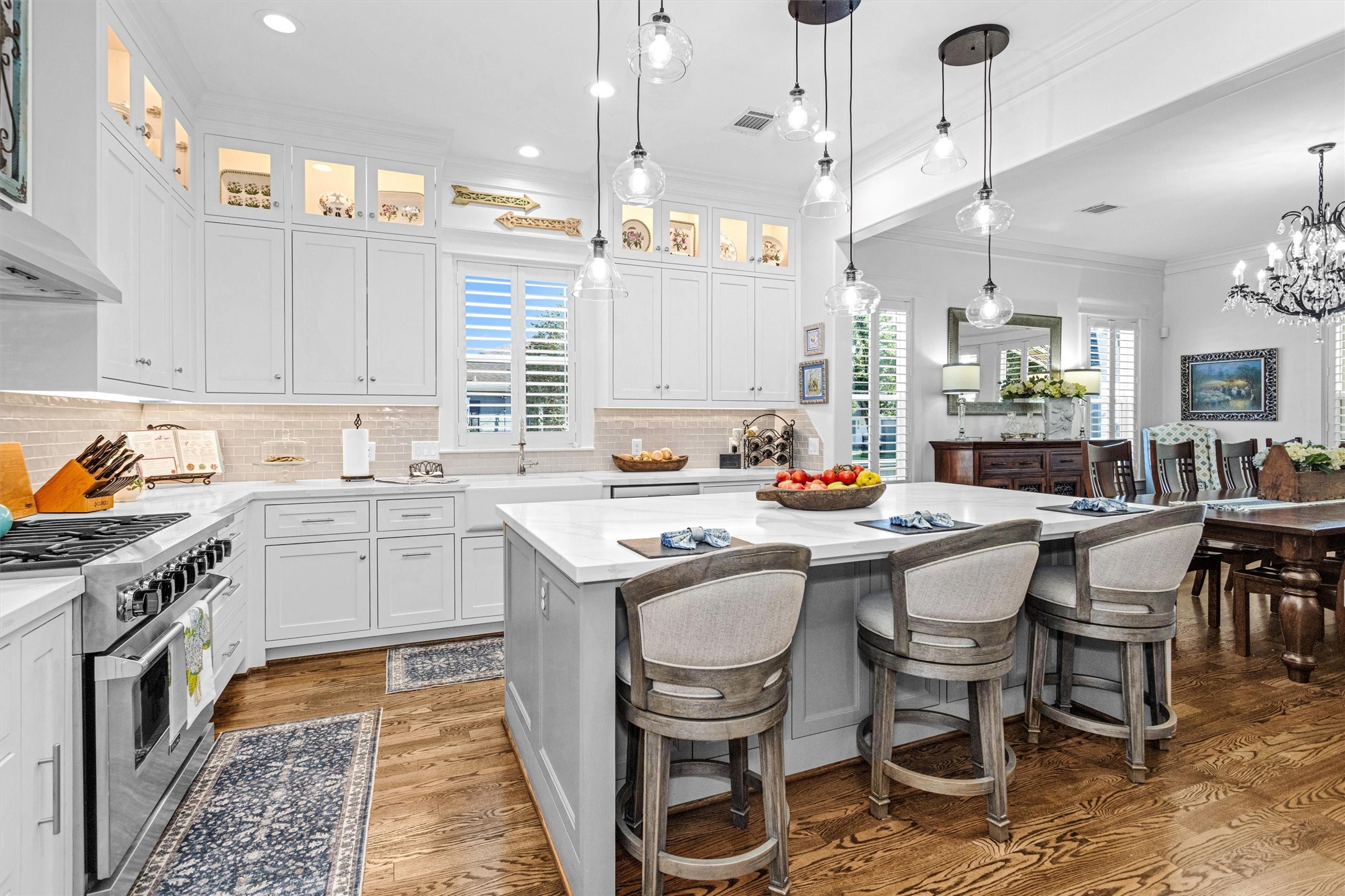 1202 Walton Street Houston, TX 77009 - Photo 1 of 32 Spacious Kitchen Island Offering Additional Seating and the Perfect Gathering Spot