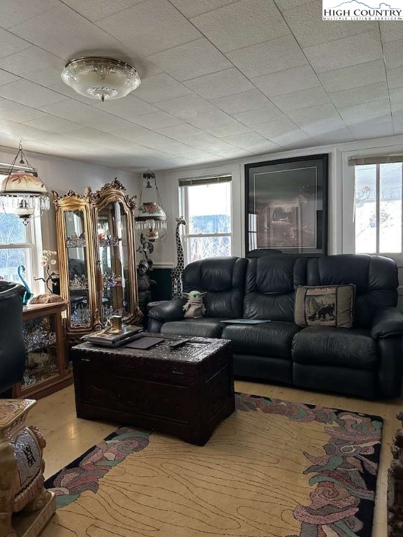 333 Mt Zion Road Deep Gap, NC 28618 - Photo 12 of 25 a living room with furniture and a large window