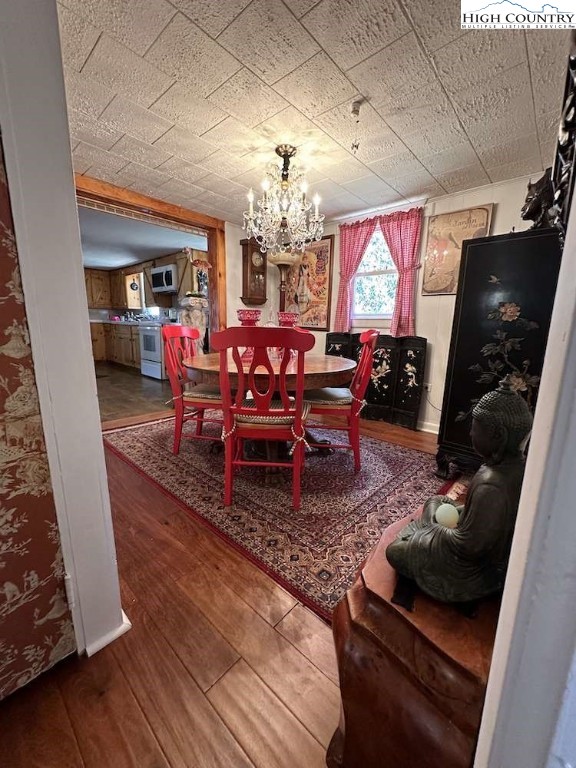 333 Mt Zion Road Deep Gap, NC 28618 - Photo 16 of 25 a living room with furniture and a chandelier