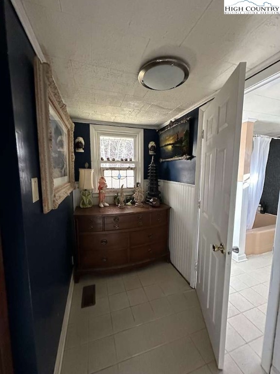 333 Mt Zion Road Deep Gap, NC 28618 - Photo 17 of 25 a room with painting on the wall and a window