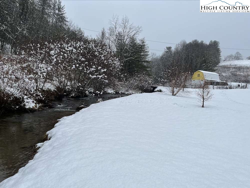 333 Mt Zion Road Deep Gap, NC 28618 - Photo 4 of 25 a view of a lake