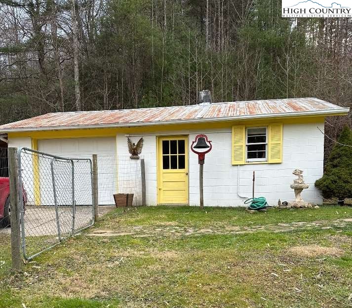 333 Mt Zion Road Deep Gap, NC 28618 - Photo 8 of 25 a view of a house with backyard