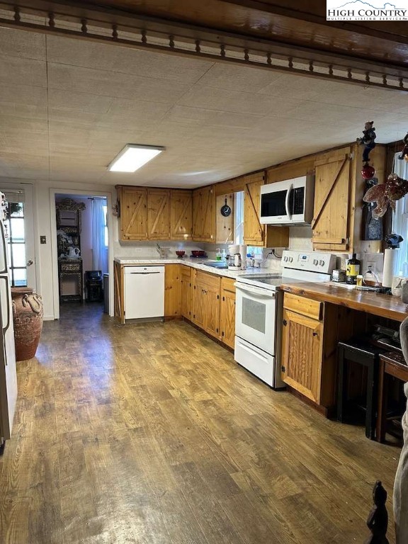 333 Mt Zion Road Deep Gap, NC 28618 - Photo 9 of 25 a kitchen with stainless steel appliances granite countertop a stove sink and cabinets
