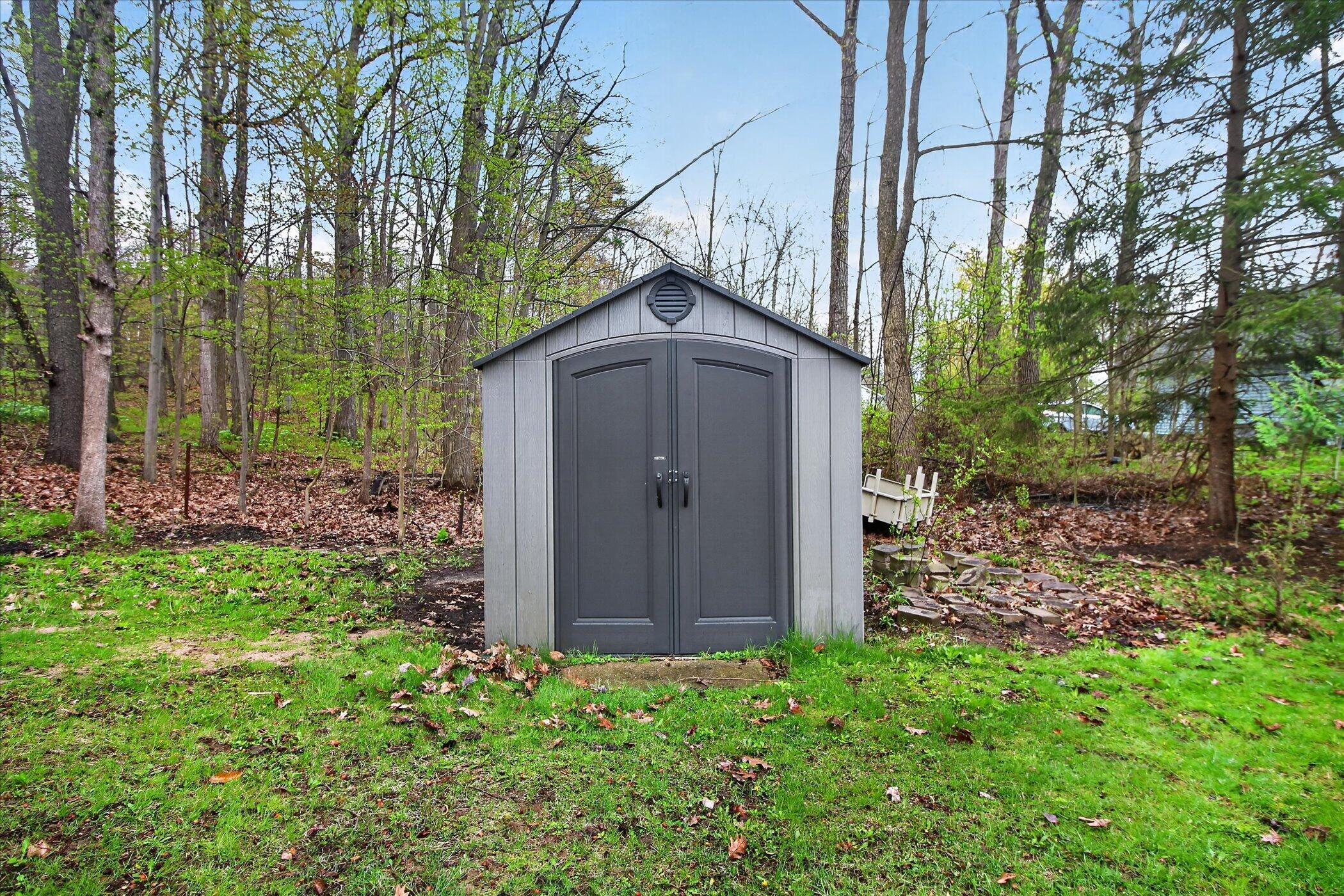 4961 Almy Road Six Lakes, MI 48886 - Photo 50 of 58 54-4961-Almy-Rd-Six-Lakes-Windowstill