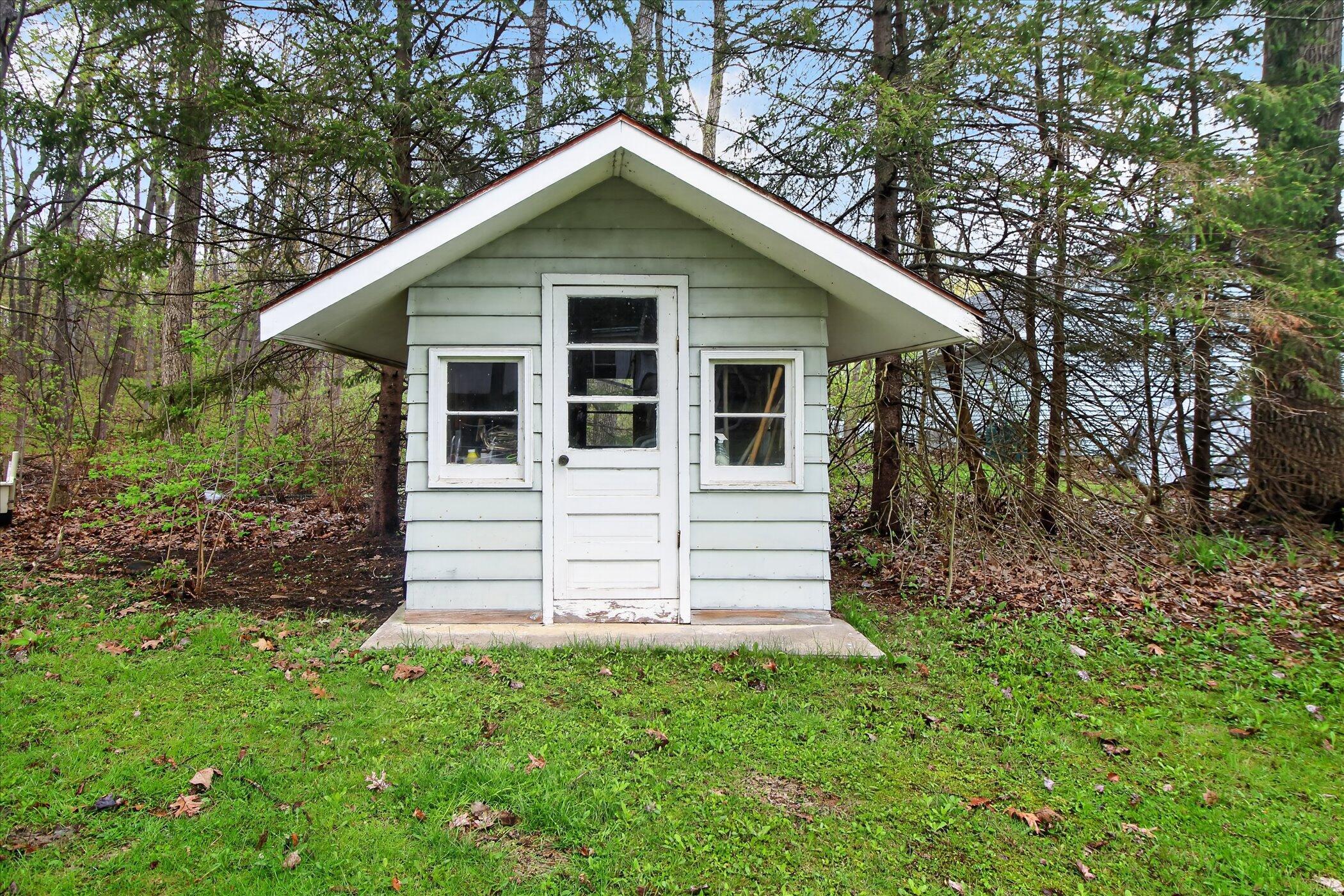 4961 Almy Road Six Lakes, MI 48886 - Photo 51 of 58 55-4961-Almy-Rd-Six-Lakes-Windowstill
