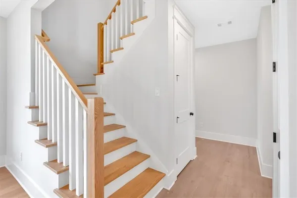 a view of staircase with white walls and white walls