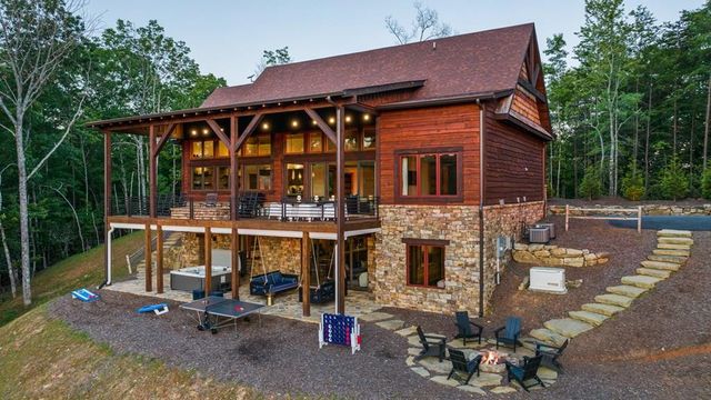 a view of a house with sitting area and furniture