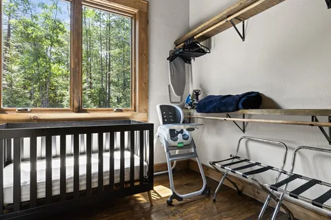 a view of a chairs and table in the balcony