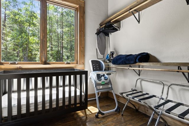 a view of a chairs and table in the balcony