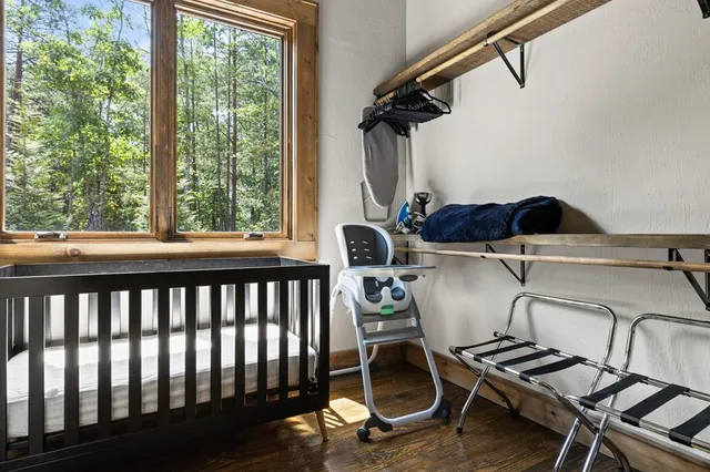 a view of a chairs and table in the balcony