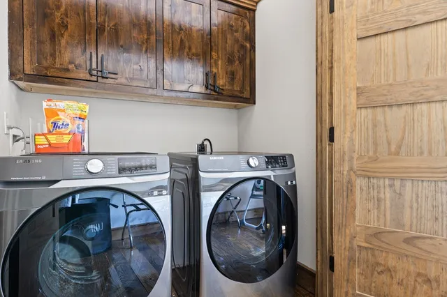 a utility room with dryer and washer