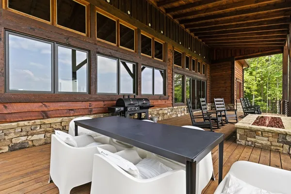 a dinning table and chairs in the patio