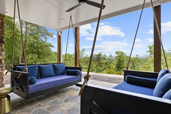 a living room with couch and a table
