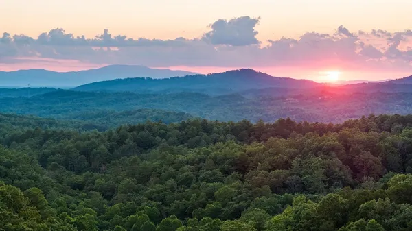 a view of a house with mountain view