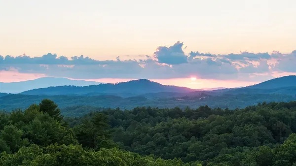 a view of a city and mountains
