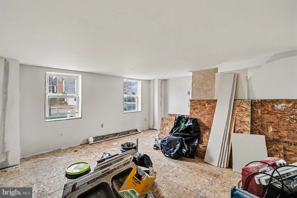 a room with furniture and a flat screen tv