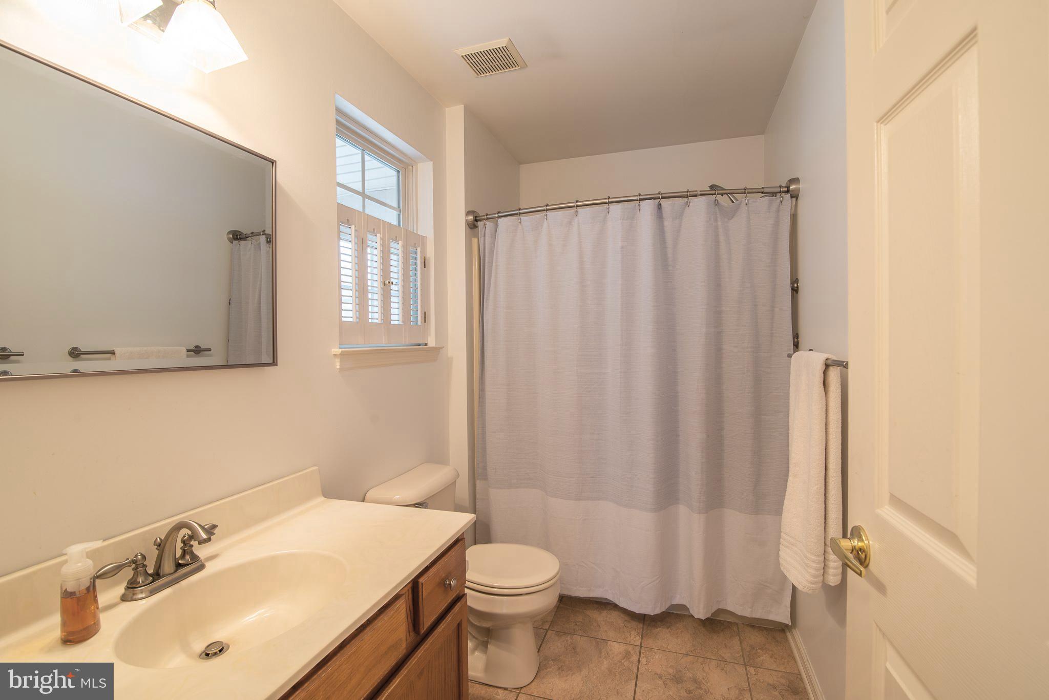 29 Clover Ridge Drive Mickleton, NJ 08056 - Photo 13 of 32 Main level full bath between 3 season room and bed