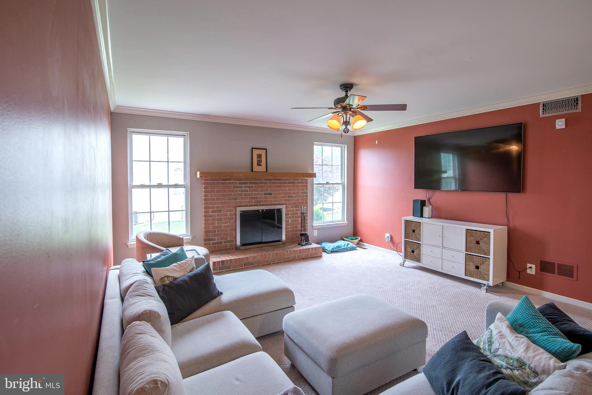 29 Clover Ridge Drive Mickleton, NJ 08056 - Photo 10 of 32 Living room fireplace view from kitchen