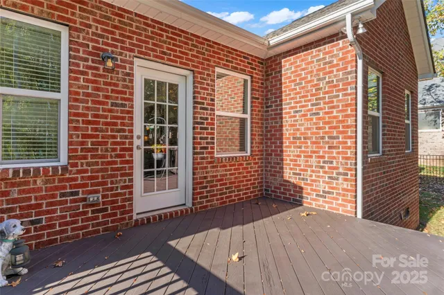 a view of backyard with a chair