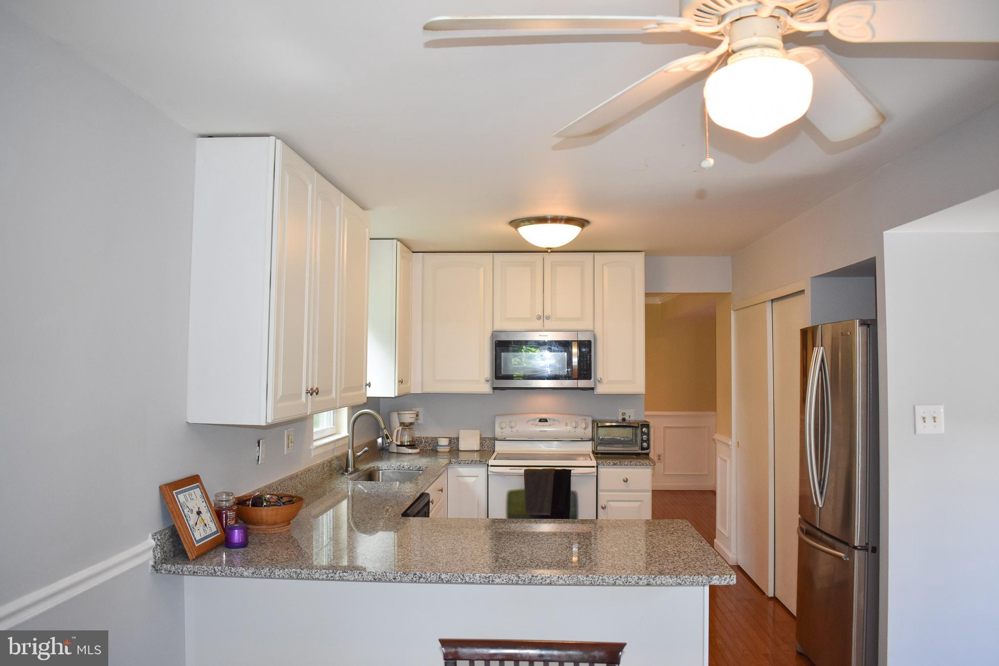 9349 Spring Water Path Jessup, MD 20794 - Photo 11 of 34 Kitchen features large pantry area, as well