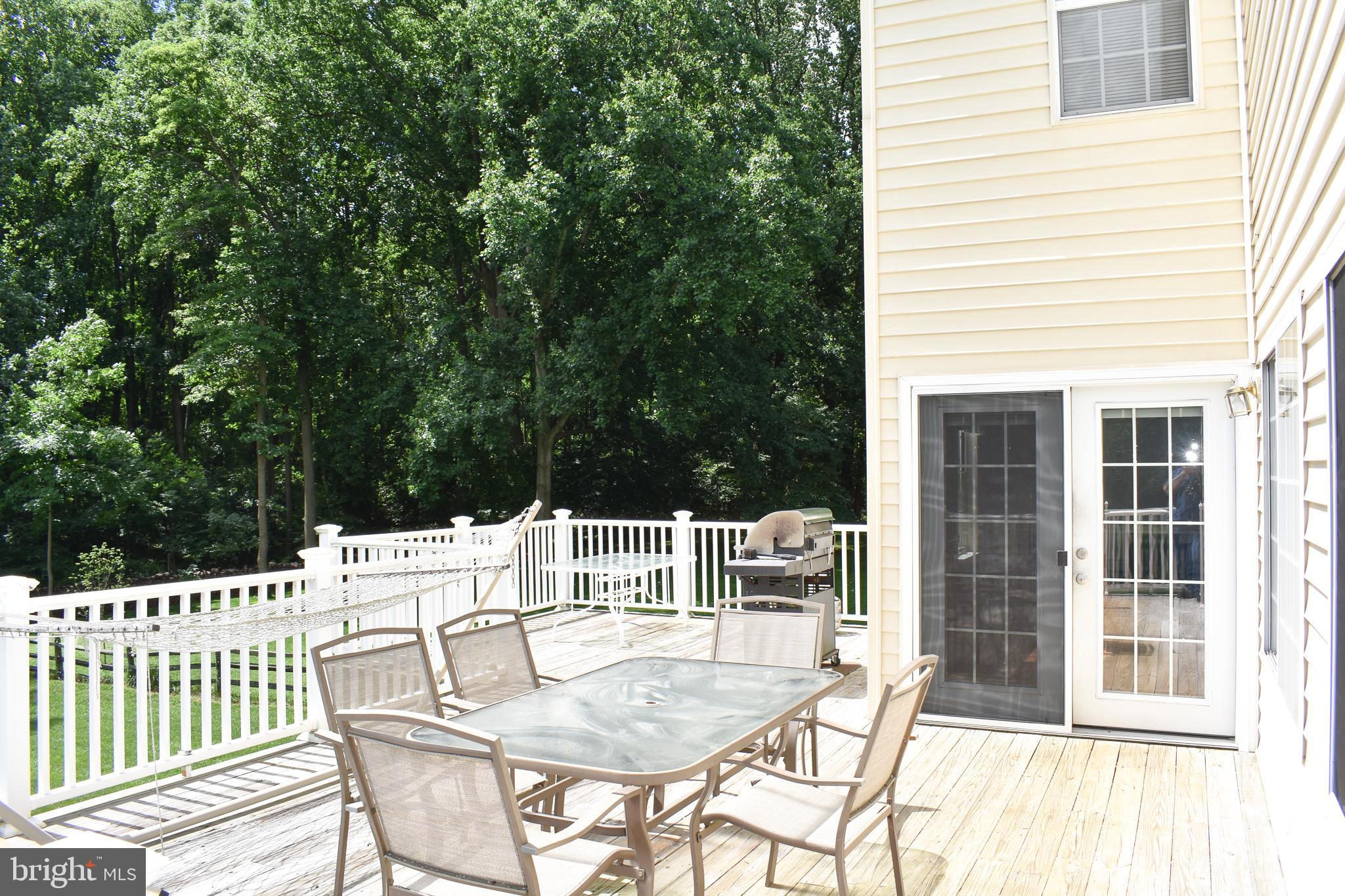 9349 Spring Water Path Jessup, MD 20794 - Photo 28 of 34 Large deck, great for entertaining.