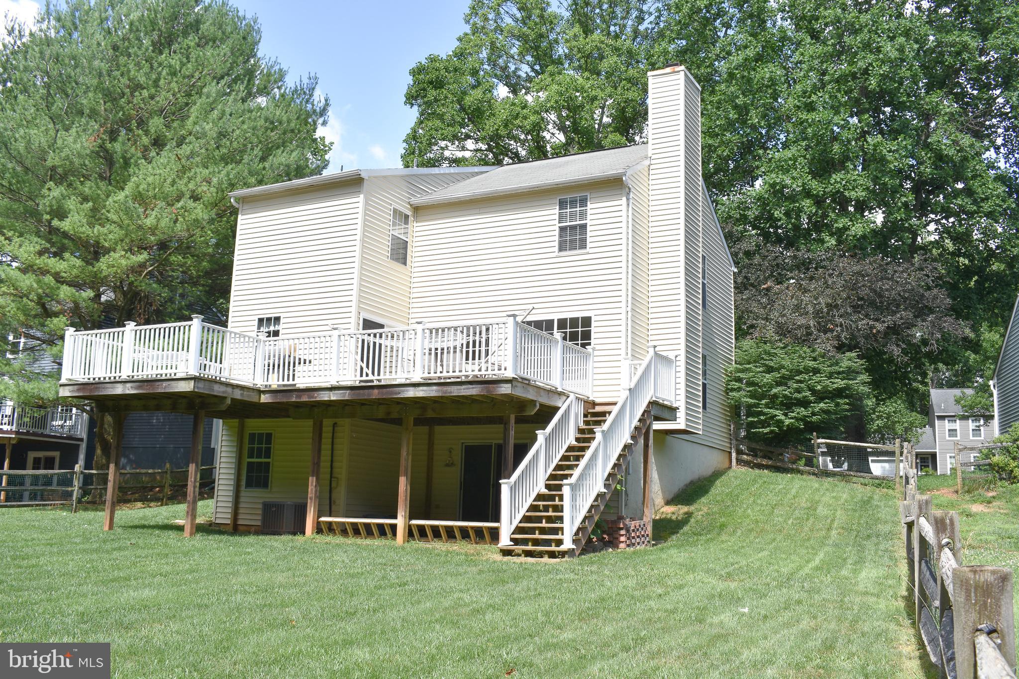 9349 Spring Water Path Jessup, MD 20794 - Photo 4 of 34 Large, fenced back yard.