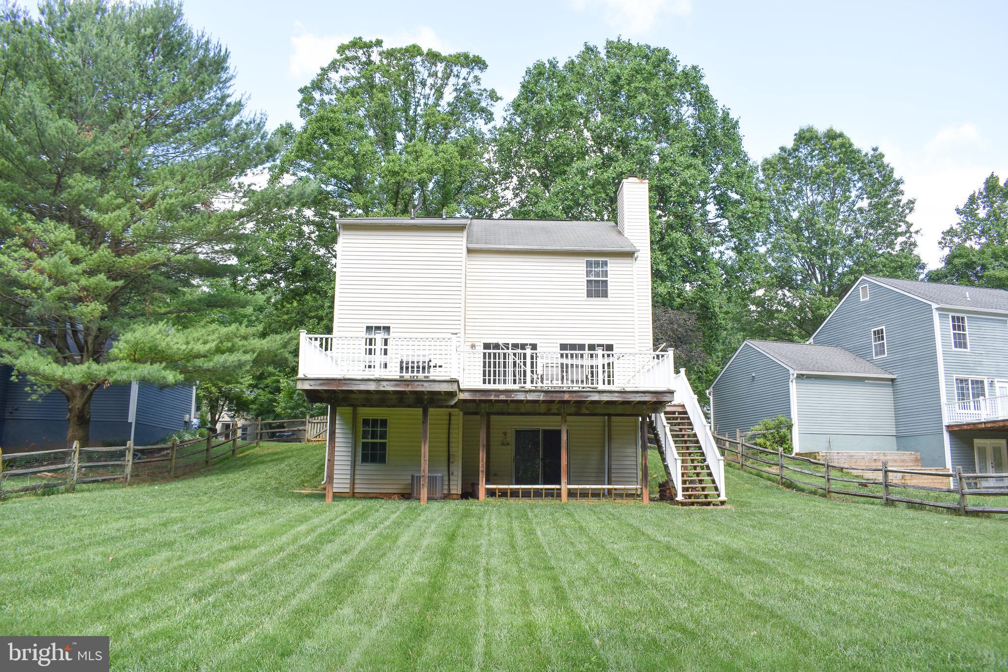 9349 Spring Water Path Jessup, MD 20794 - Photo 5 of 34 Large, .41 acre, fenced in back yard.