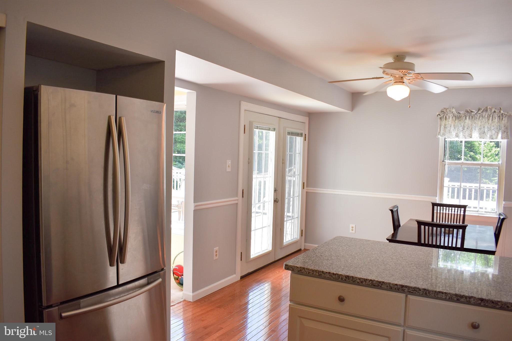 9349 Spring Water Path Jessup, MD 20794 - Photo 8 of 34 Updated kitchen, with new, granite countertops.