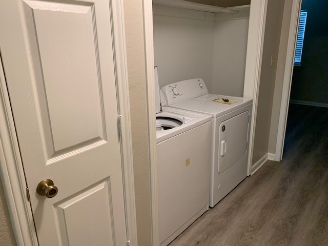 422 Nursery Road Spring, TX 77380 - Photo 12 of 26 a utility room with dryer and washer