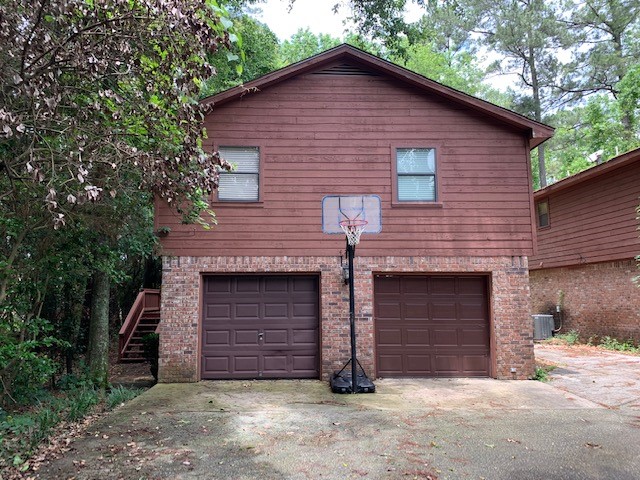 422 Nursery Road Spring, TX 77380 - Photo 2 of 26 a front view of a house with garage