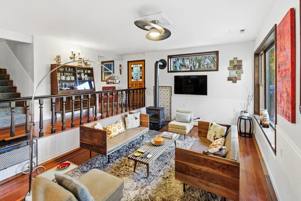 a living room with furniture and a window