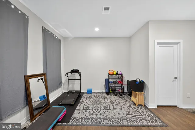 a room with furniture and a flat screen tv