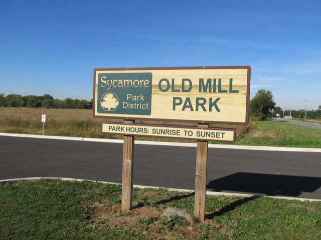 983 Kelly Lane, Unit 983 Sycamore, IL 60178 - Photo 22 of 25 a view of a sign board with lake view
