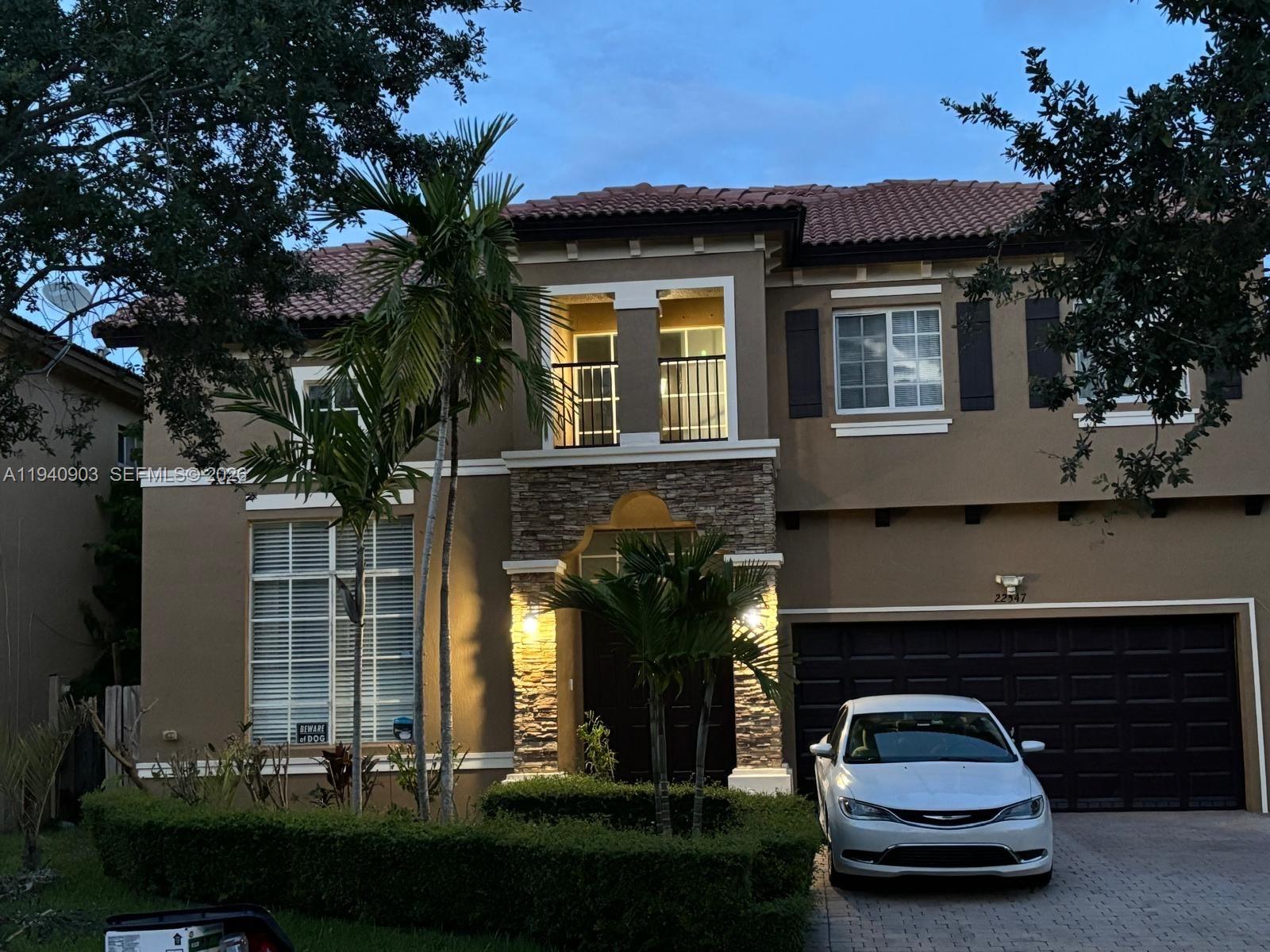 a car parked in front of a house